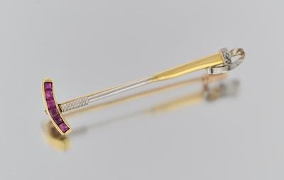 Appraisal: An k Gold and Ruby Polo Mallet Pin k white