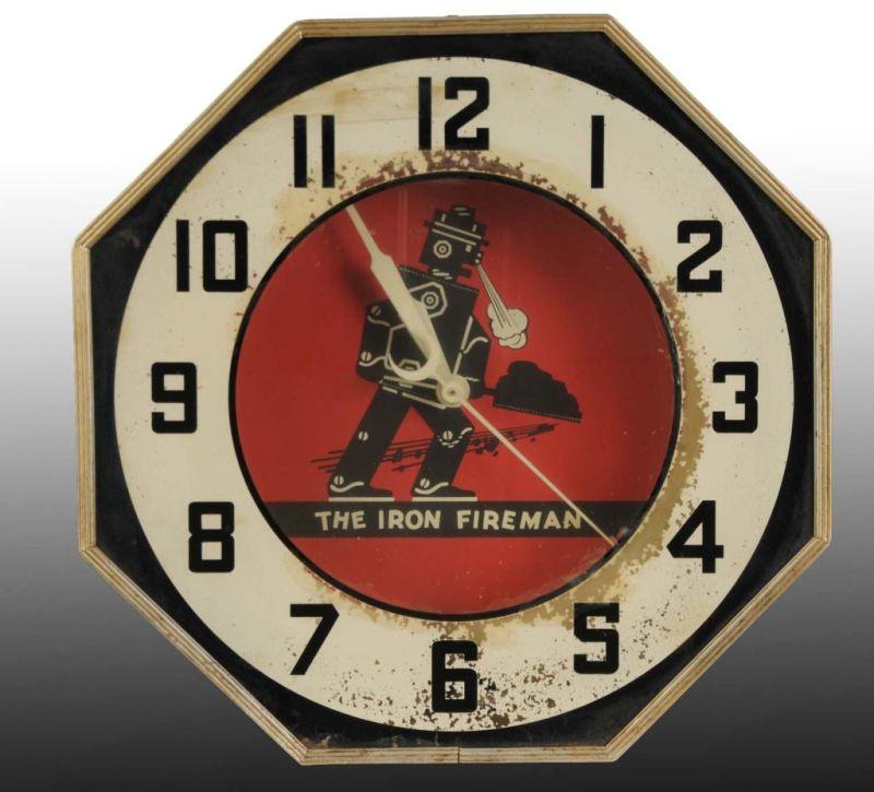 Appraisal: Iron Fireman Electric Octagonal Neon Clock Description s Working Heavy