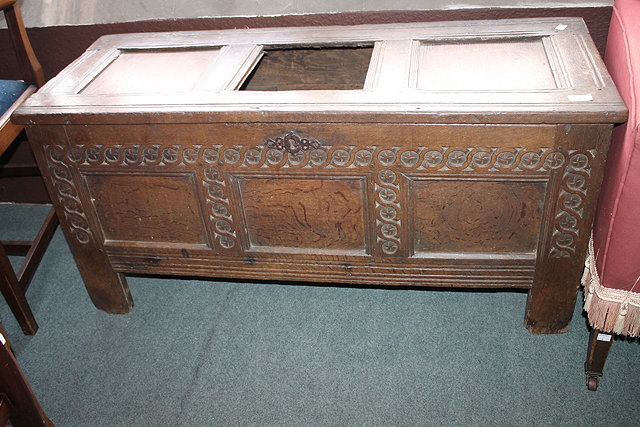 Appraisal: AN TH CENTURY OAK COFFER with carved front missing panel