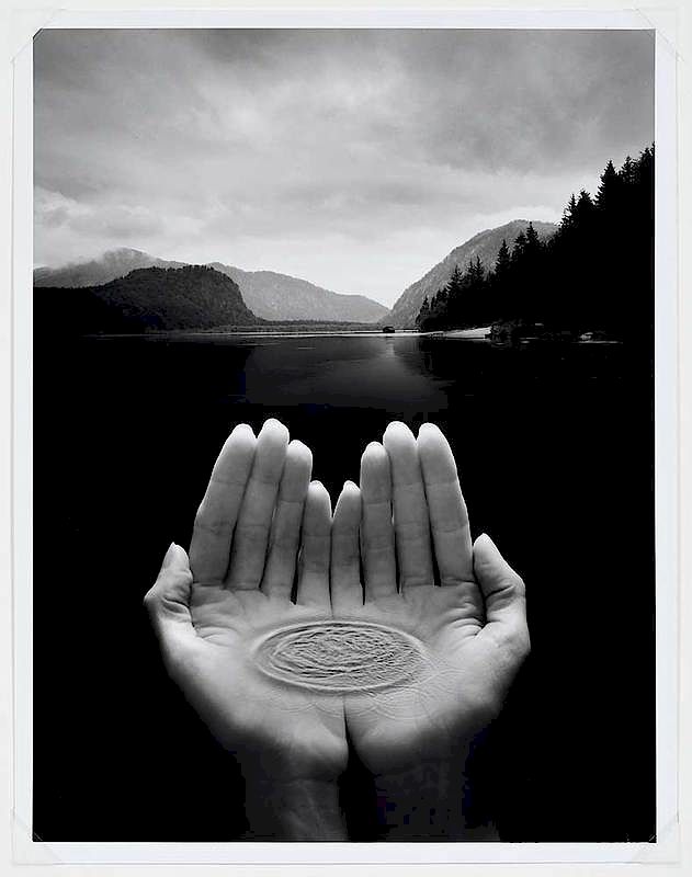 Appraisal: Jerry Uelsmann American b Untitled Hands Emerging from Lake signed