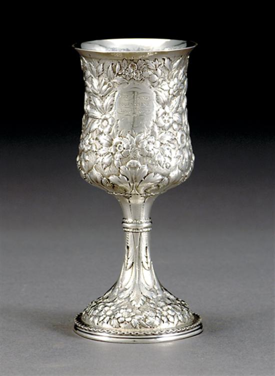 Appraisal: Kirk Son silver trophy chalice circa abundantly floral-chased tulip-form bowl