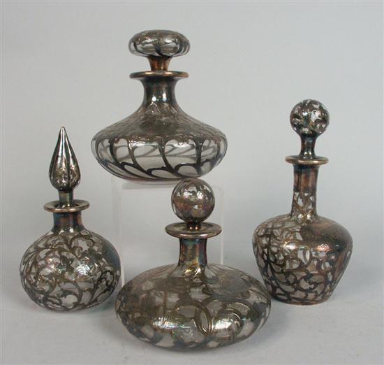 Appraisal: NINE VICTORIAN SILVER OVERLAY GLASS BOTTLES and a SILVER OVERLAY