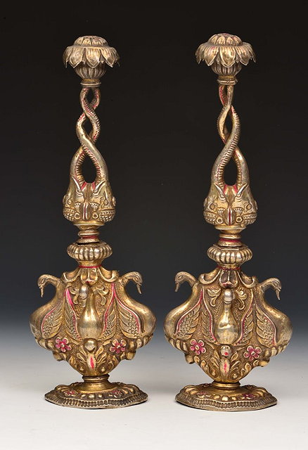 Appraisal: A PAIR OF INDIAN SILVER ROSEWATER SPRINKLERS decorated with upturned