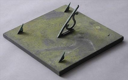 Appraisal: CAST METAL SUNDIAL Unusual slate sundial of square form with