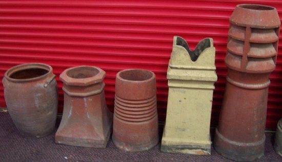 Appraisal: A louvre top chimney pot three others and a bread