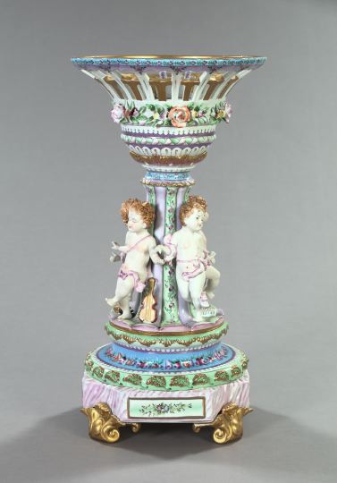 Appraisal: Monumental Continental Richly Polychromed and Parcel-Gilded Reticulated Porcelain Four Putti