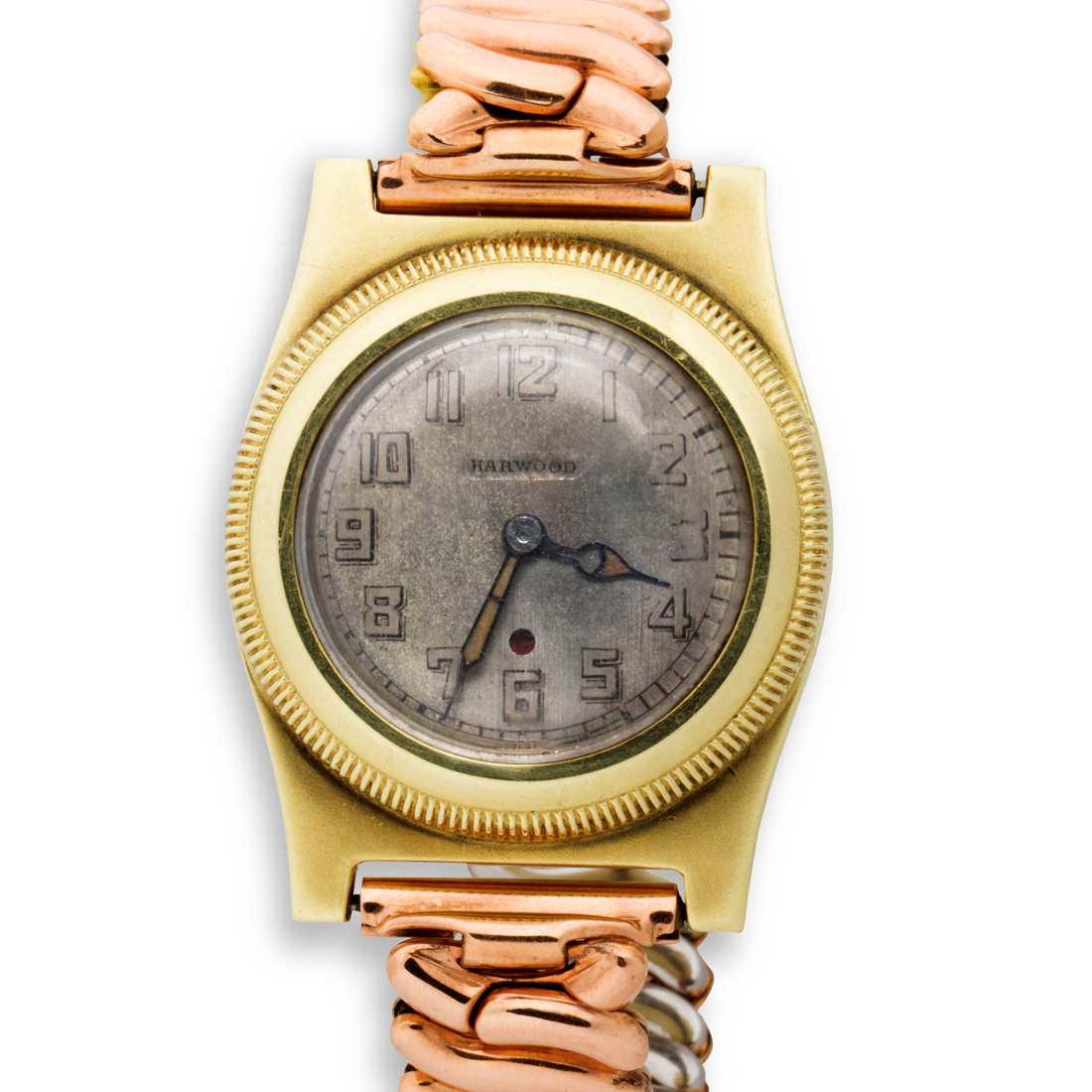 Appraisal: A FOURTEEN KARAT GOLD WRISTWATCH HARDWOOD A fourteen karat gold