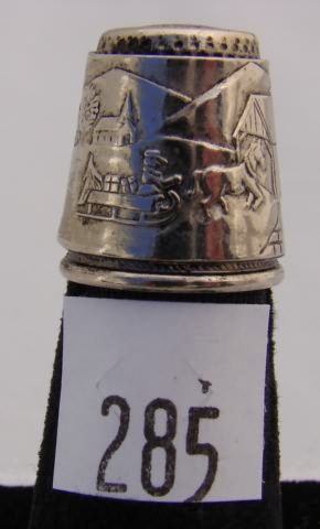 Appraisal: Silver tone thimble with scenic design