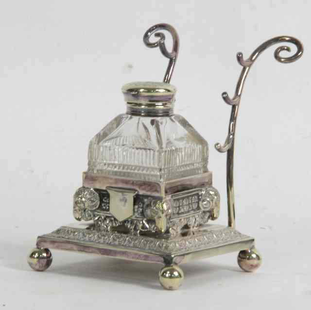 Appraisal: An ink stand and pen tray with scroll support and