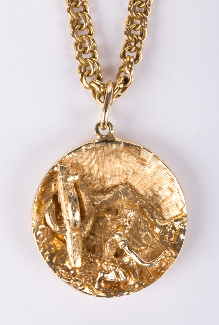 Appraisal: A Long Gold K Chain with a Scenic Pendant K