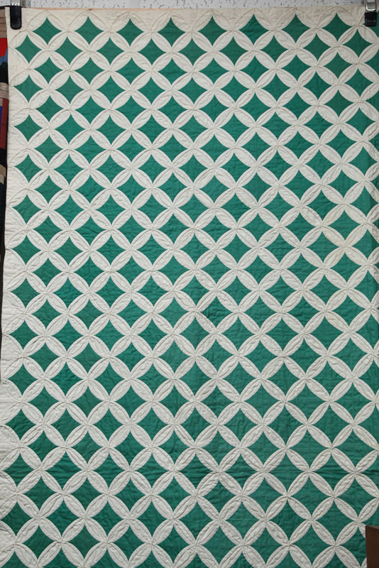 Appraisal: QUILT In green and white Cathedral Window pattern '' x