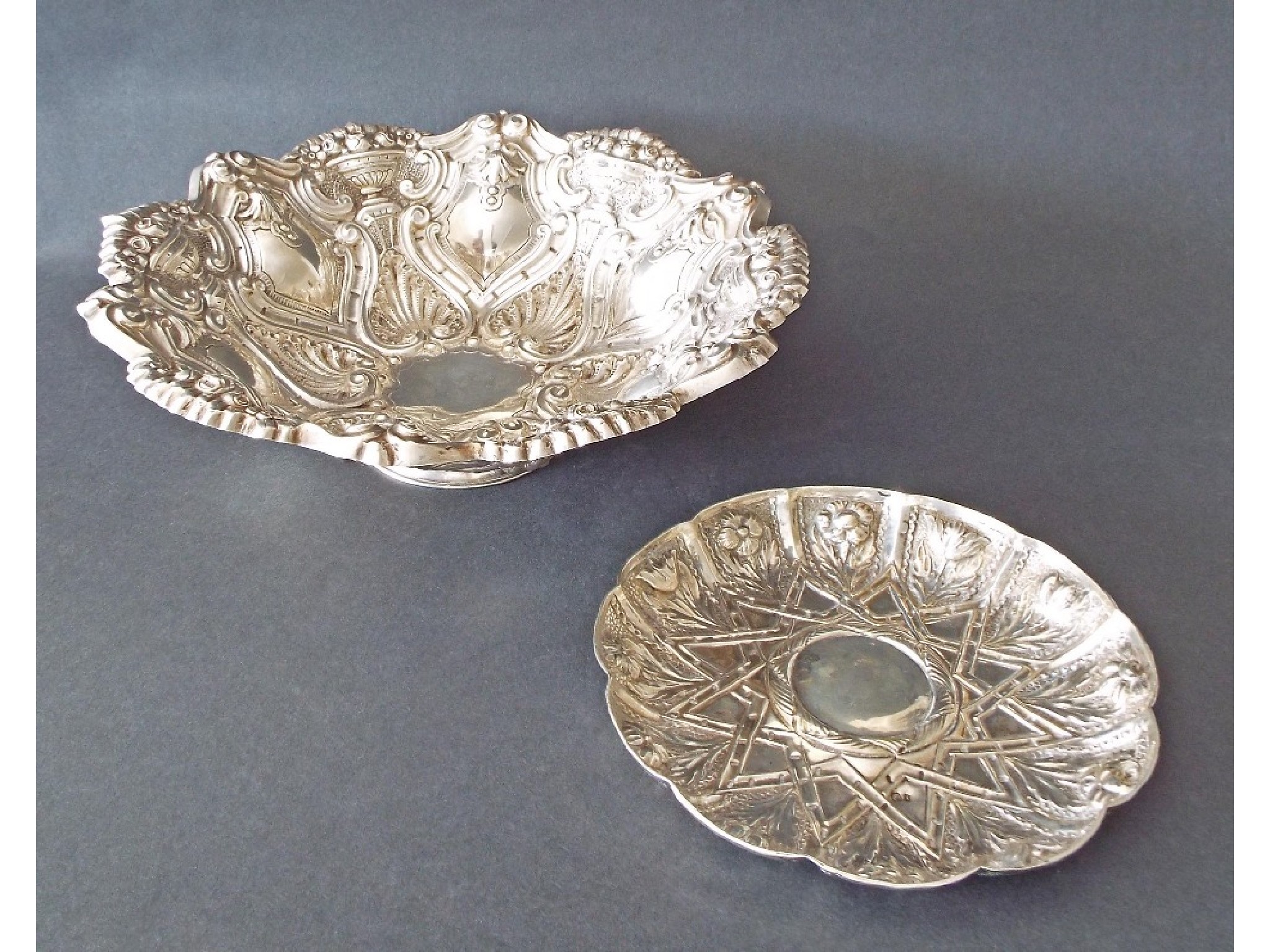 Appraisal: Portuguese silver relief fruit bowl decorated with panels of flowering