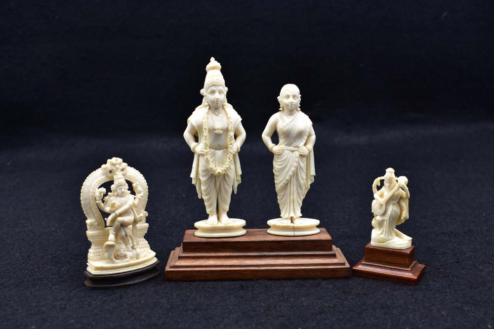 Appraisal: FOUR EAST INDIAN FIGURAL CARVINGSComprising a prince and princess together