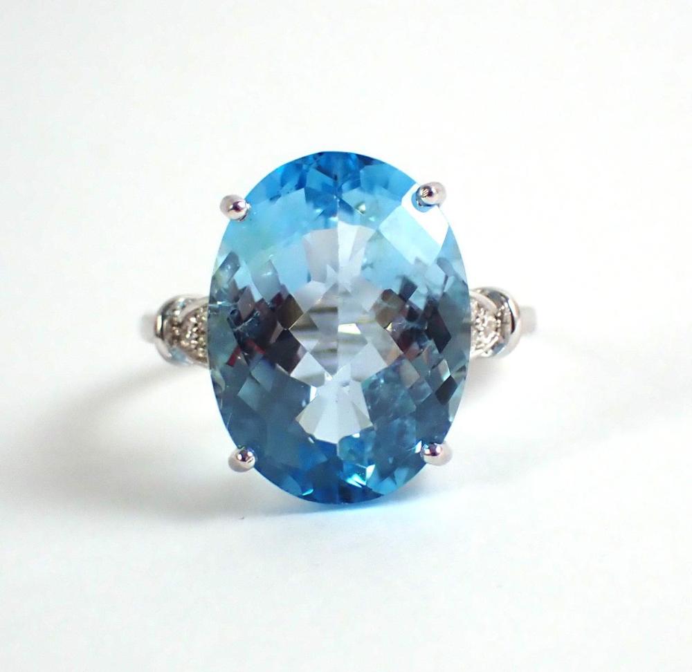 Appraisal: BLUE TOPAZ DIAMOND AND FOURTEEN KARAT GOLD RING The k