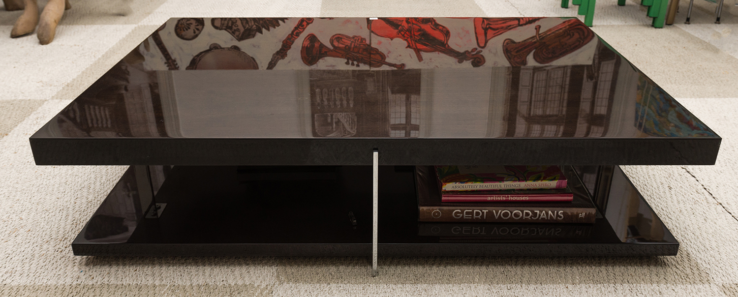 Appraisal: A 'MALERBA' CONTEMPORARY TWO TIERED COFFEE TABLE WITH A POLISHED