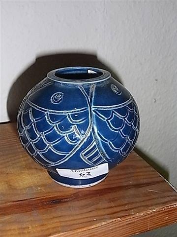 Appraisal: A CHINESE BLUE GLAZED JAR with stylised fish decoration six