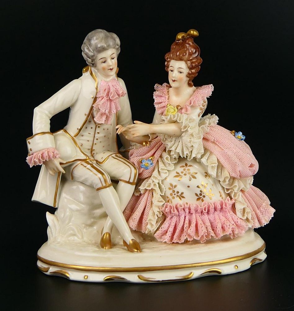 Appraisal: DRESDEN FIGURINE OF A COURTING COUPLE Measures tall X wide