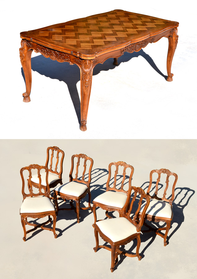 Appraisal: FRENCH WALNUT DRAW LEAF DINING TABLE AND CHAIRS Parquetry veneer