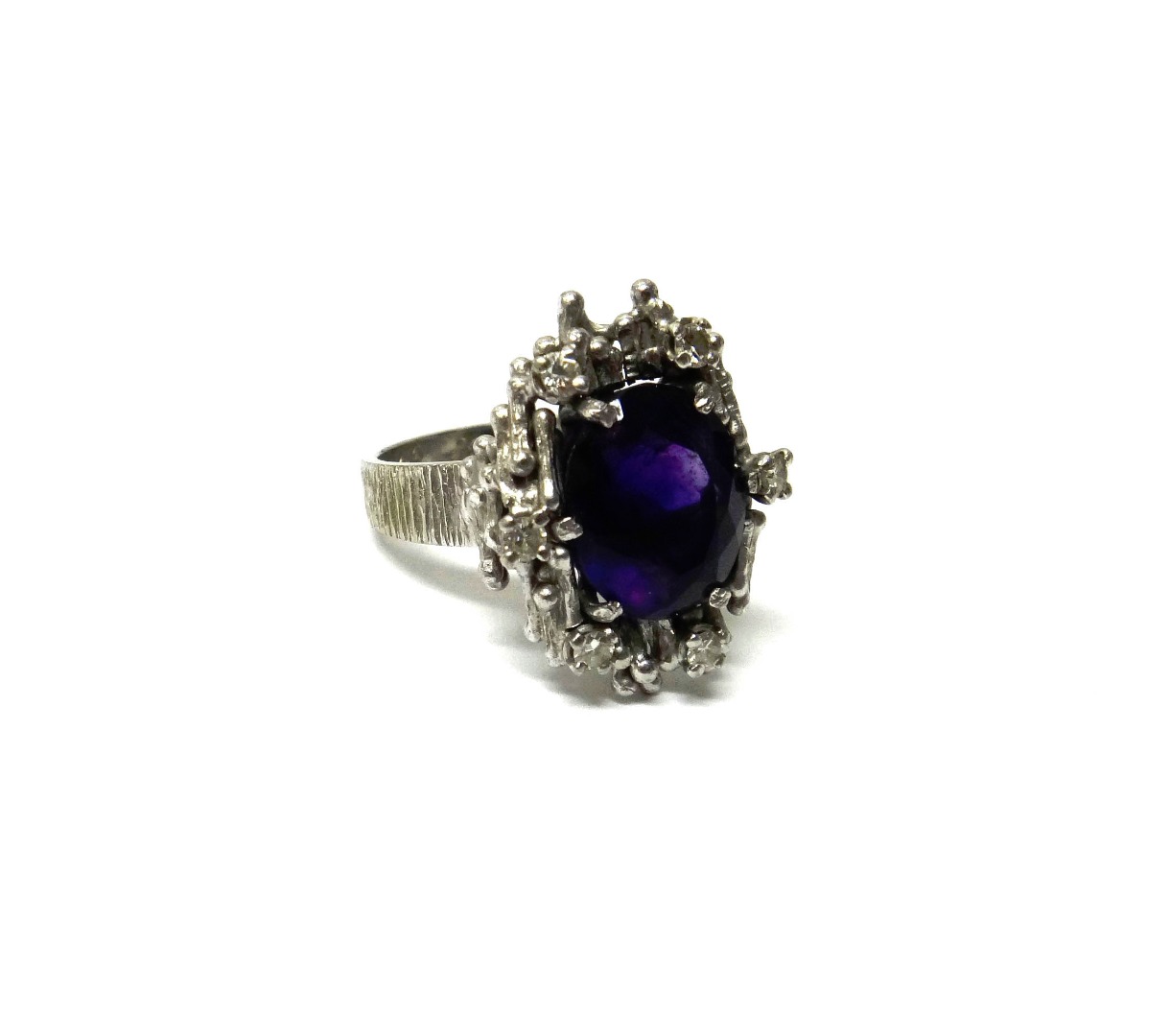 Appraisal: An ct white gold amethyst and diamond ring claw set