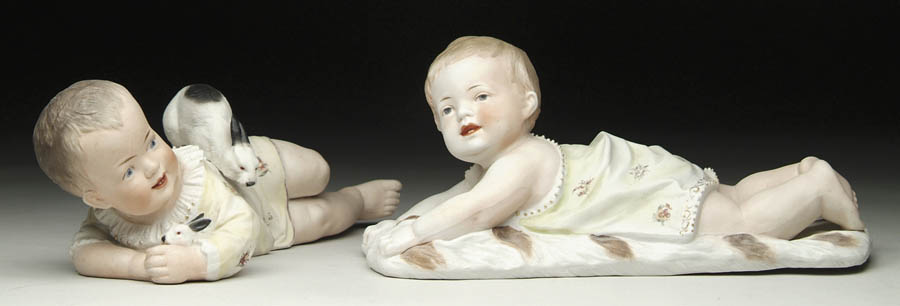 Appraisal: TWO BISQUE PIANO BABIES One shown lying on a fur