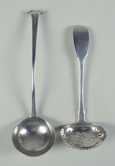 Appraisal: Two English Silver Ladles One a fiddleback sugar sifter hallmarked