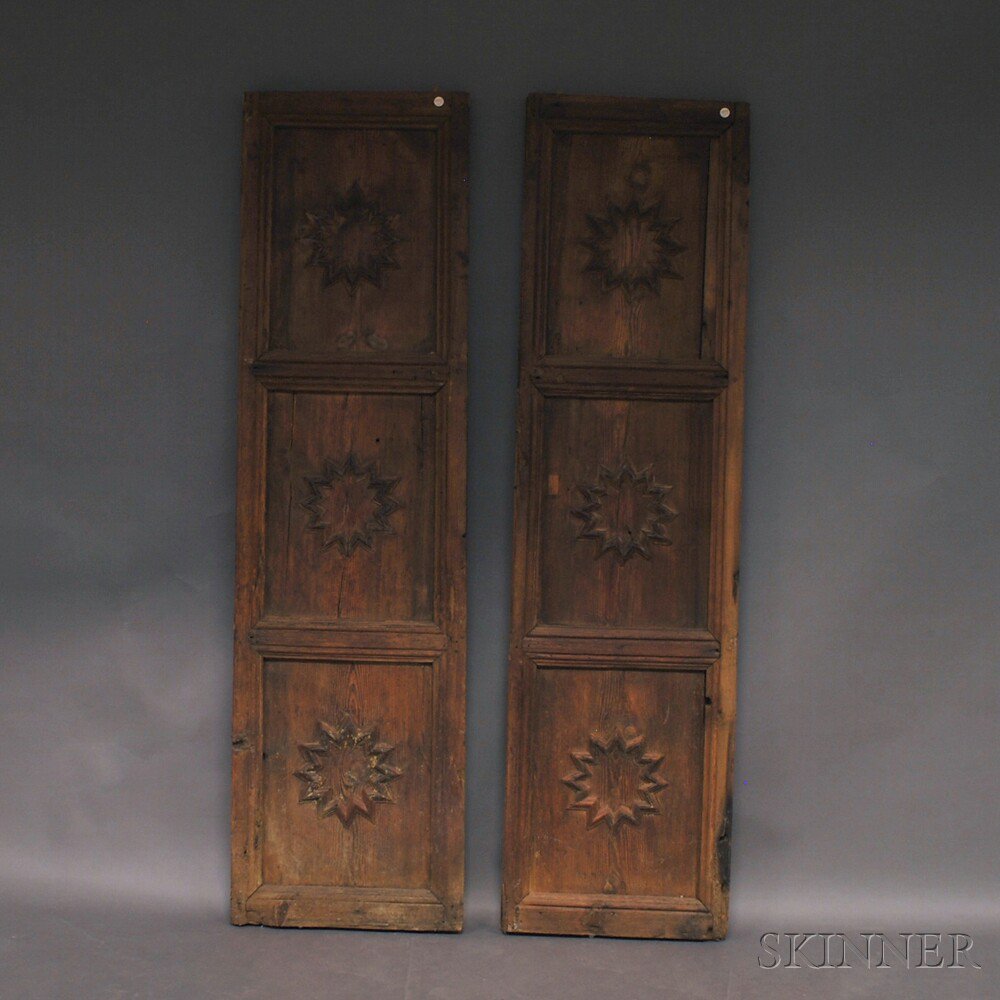 Appraisal: Pair of Carved Door Panels with Applied Molded Twelve-point Star