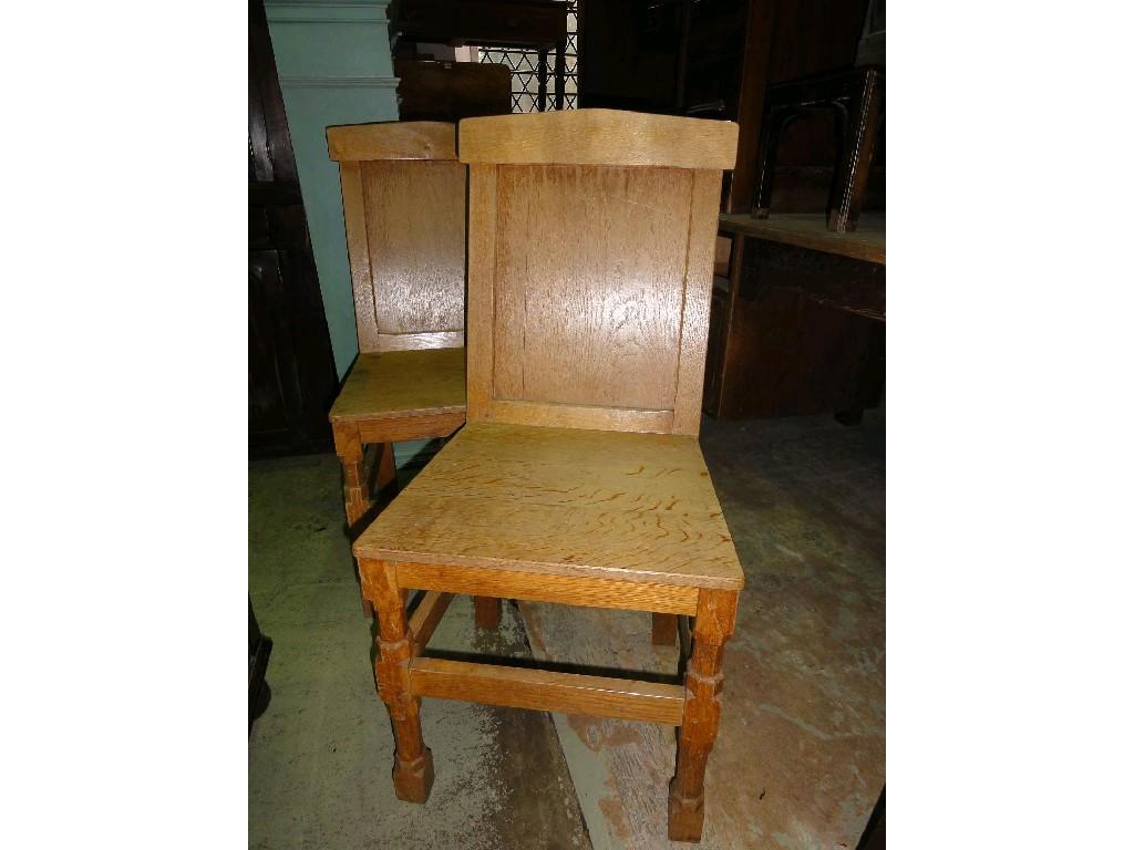 Appraisal: A pair of light oak gothic revival side chairs with