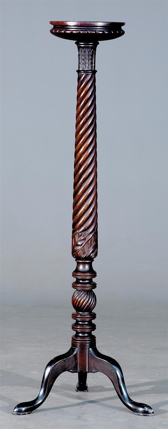 Appraisal: English carved mahogany torchere late th early th century circular