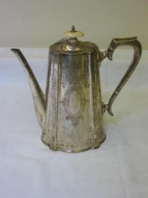 Appraisal: A VICTORIAN COFFEE POT of moulded tapered oblong form with