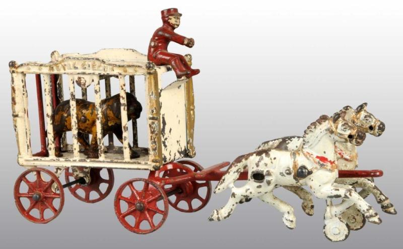 Appraisal: Cast Iron -Horse Royal Circus Cage Wagon Toy Description All