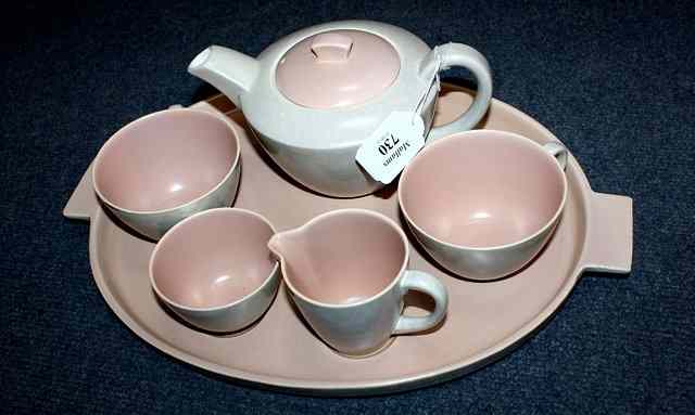 Appraisal: A POOLE POTTERY MORNING TEA SET consisting of teapot two