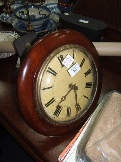 Appraisal: A Victorian postman's alarm clock with circular dial Roman numerals