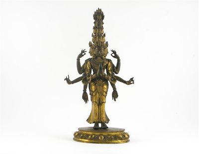 Appraisal: A Tibeto-Chinese gilt bronze model of Avalokitesvara standing on an