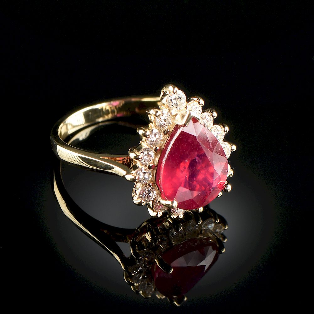 Appraisal: A K YELLOW GOLD NATURAL RUBY AND DIAMOND LADY'S RING