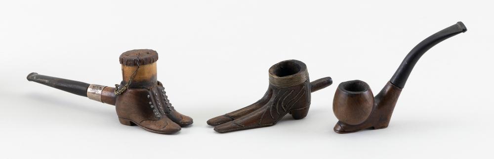 Appraisal: THREE BOOT-FORM TREEN PIPES LATE TH EARLY TH CENTURY LENGTHS