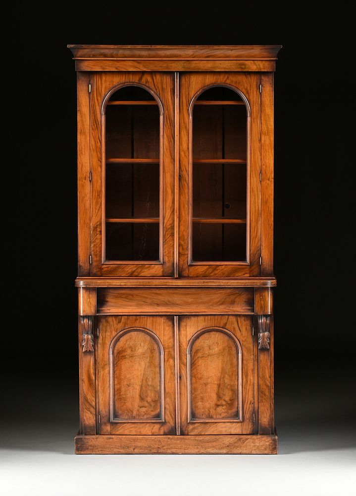 Appraisal: AN AMERICAN CLASSICAL WALNUT ROSEWOOD AND MAHOGANY BOOKCASE CABINET s