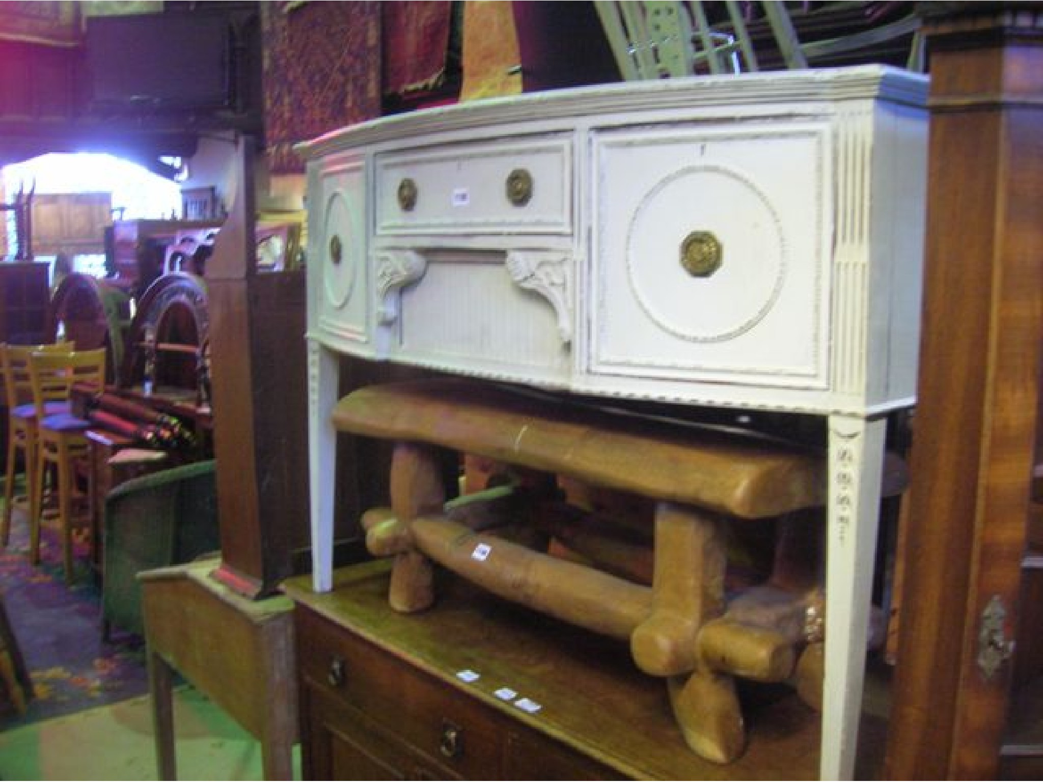 Appraisal: An Edwardian mahogany bow fronted sideboard fitted with an arrangement