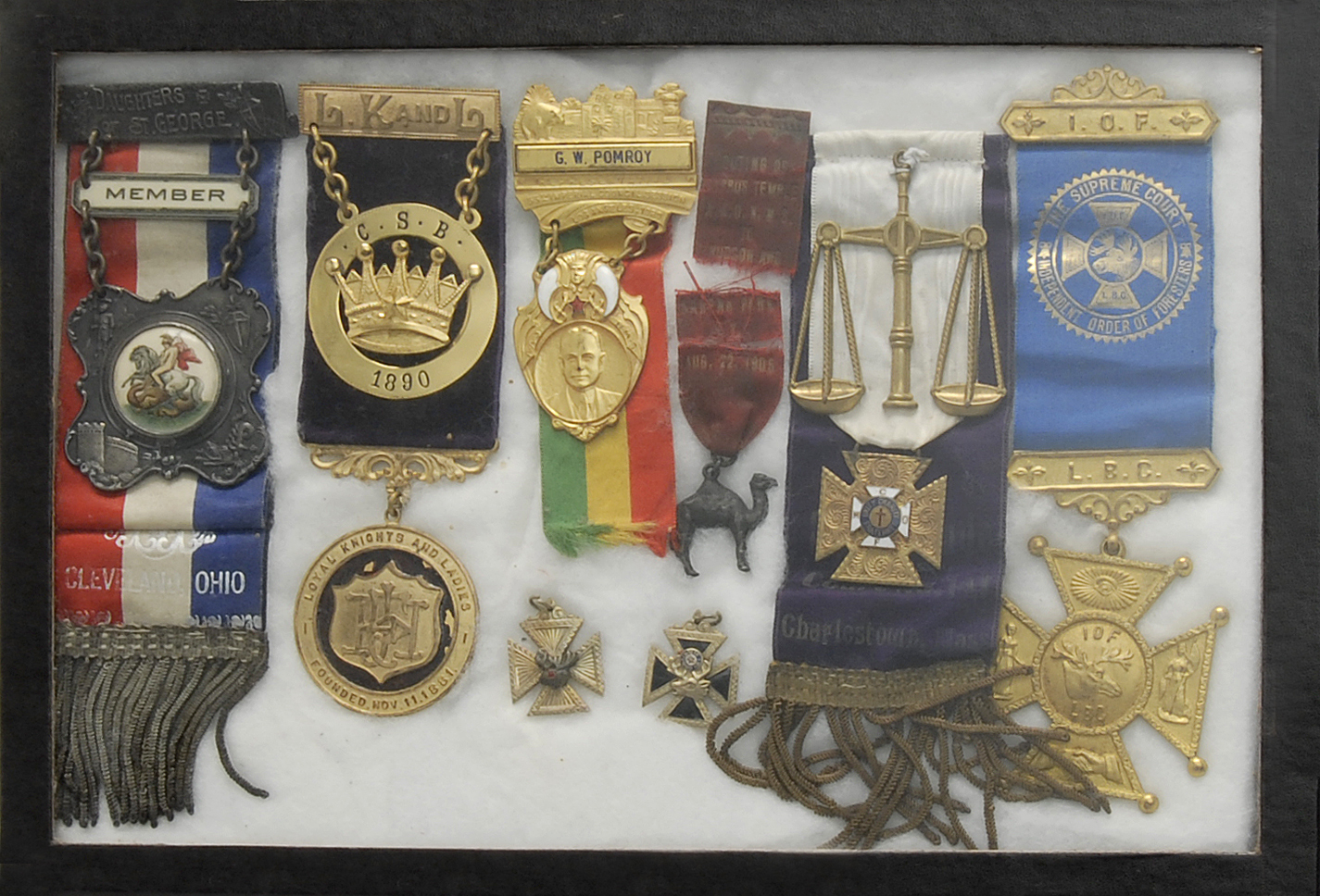 Appraisal: EIGHT FRAMED FRATERNAL MEDALS Sizes and materials vary Mounted together