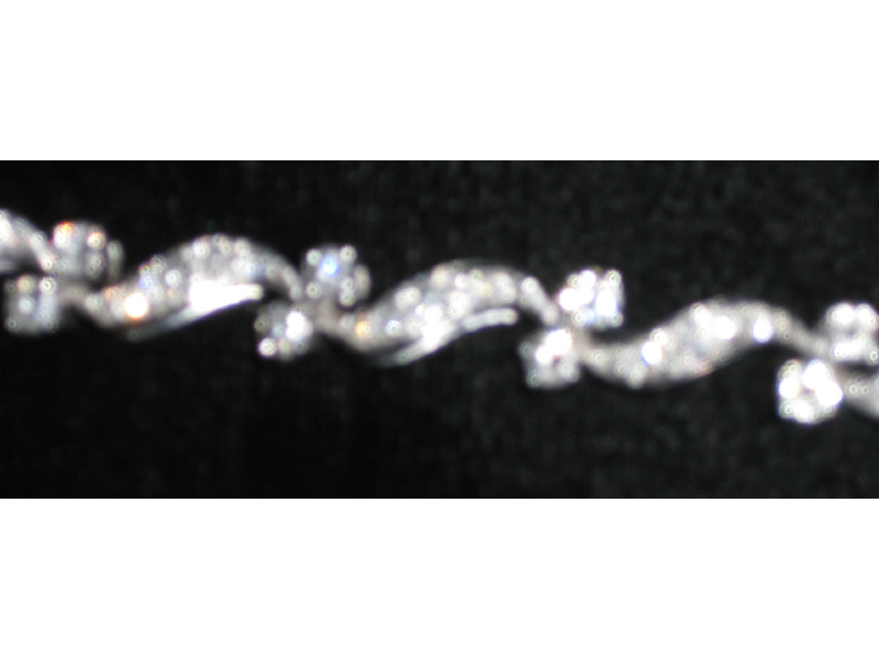 Appraisal: DIAMOND BRACELET Platinum bracelet with prong set diamonds alternating with