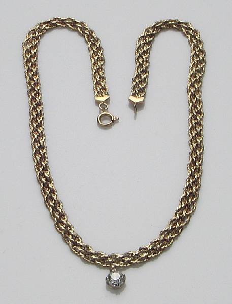 Appraisal: A diamond necklace mount and chain in fourteen karat gold