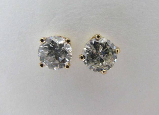 Appraisal: k yellow gold mounted ctw round brilliant cut diamond studs