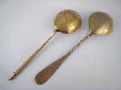 Appraisal: Two Russian silver gilt spoons with bright cut engraved bowls