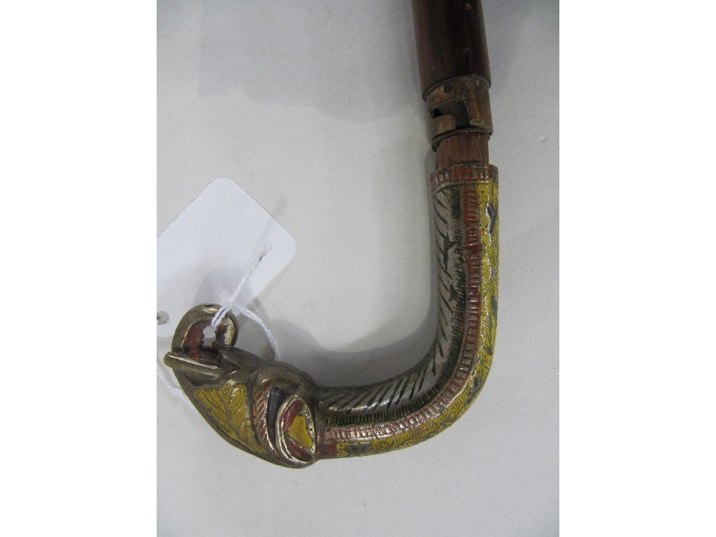 Appraisal: Swordstick with enamelled metal handle modelled as an elephant's head