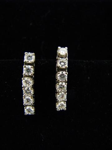 Appraisal: A pair of K white gold dangle earrings each with