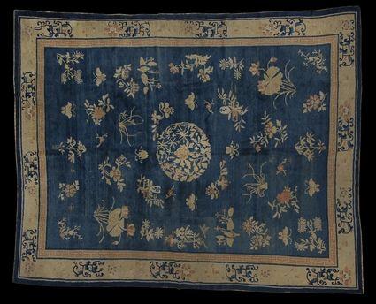 Appraisal: CHINESE WOOLWORK CARPET The light blue field worked with a