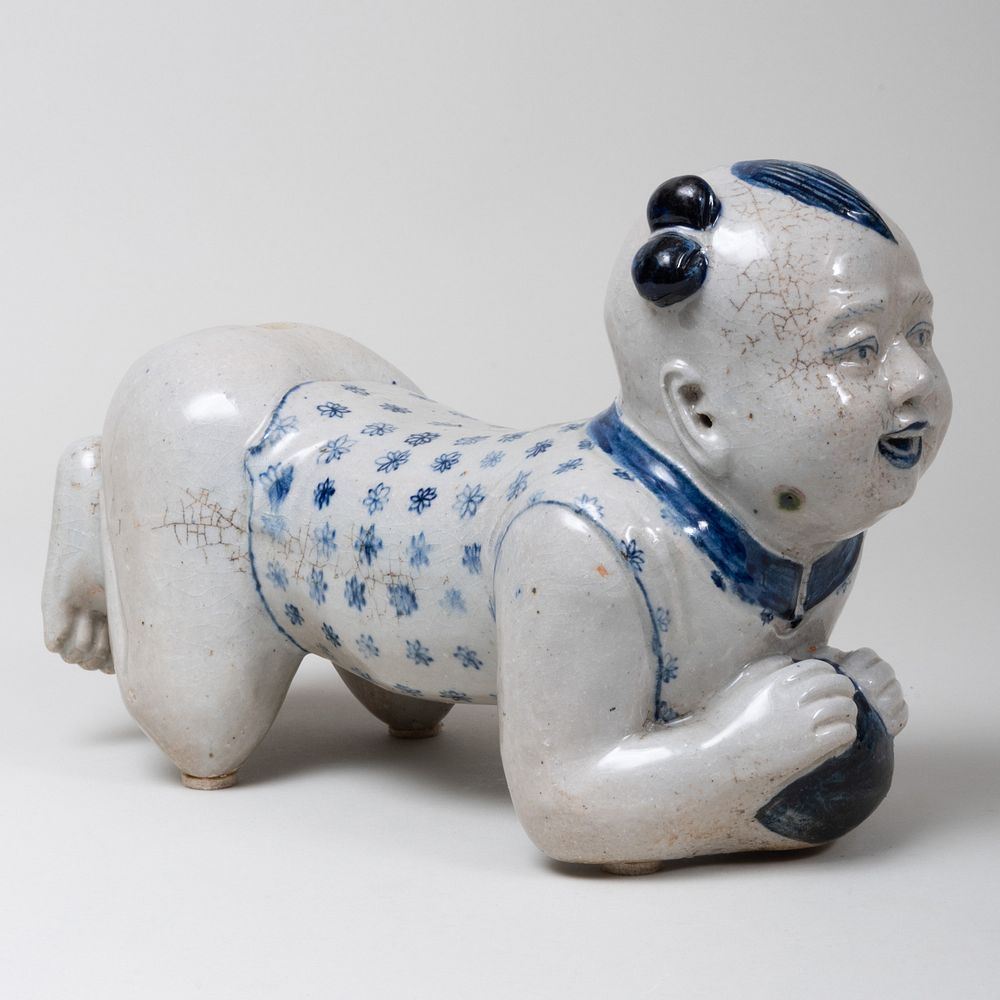 Appraisal: Chinese Blue and White Porcelain Boy Form Pillow in long