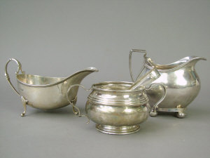 Appraisal: A Georgian silver cream jug of regency design with reeded