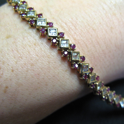 Appraisal: RUBY COLORLESS GEMSTONE AND FOURTEEN KARAT GOLD BRACELET set with