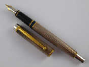 Appraisal: A Silver Pilot fountain pen with blue enamel band