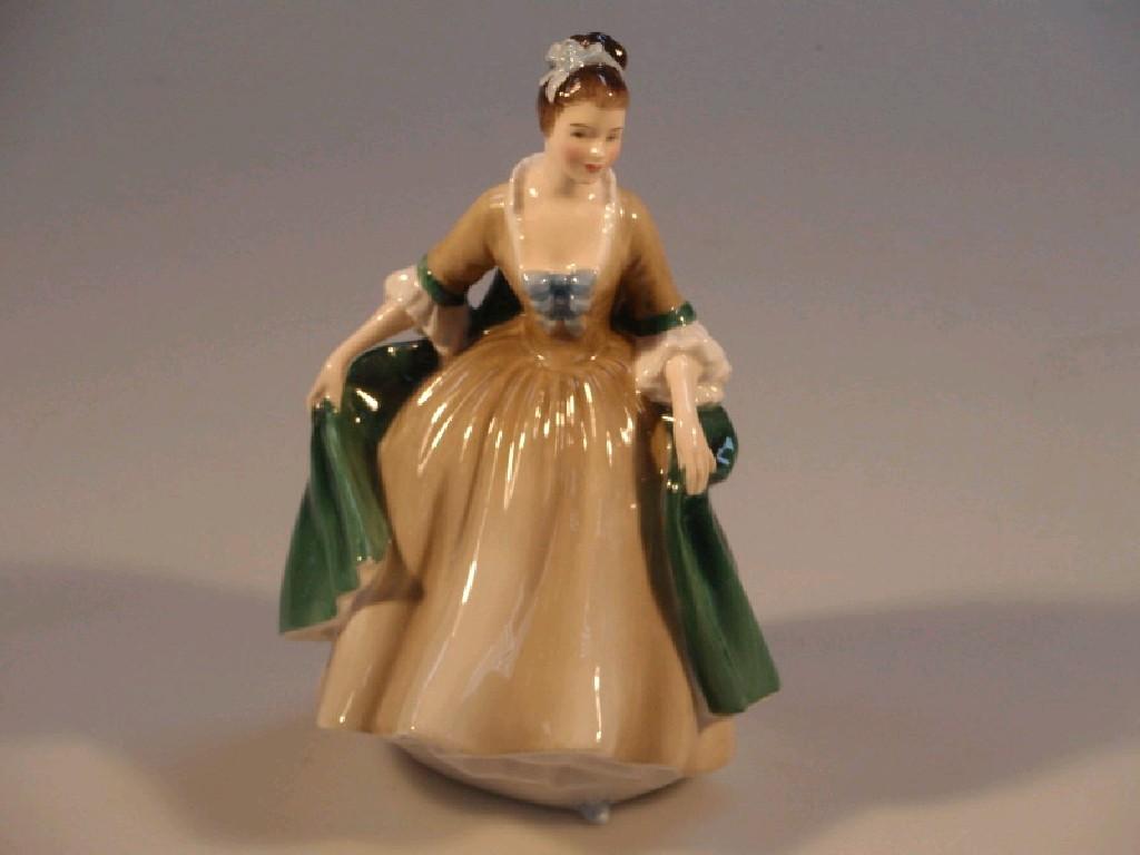 Appraisal: A Royal Doulton figure 'Elegance' HN cm high